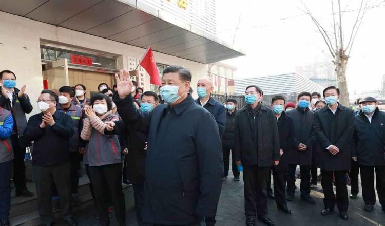 Gobierno de China reanuda actividades en medio de la epidemia de coronavirus; el presidente usa cubrebocas