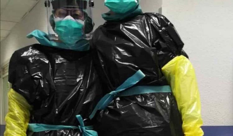 Sanidad española al borde del colapso por el coronavirus; se protegen con bolsas de basura