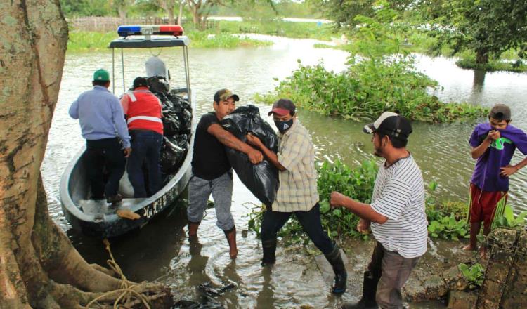 Regresan familias de 14 comunidades de Emiliano Zapata a sus casas tras concluir inundaciones