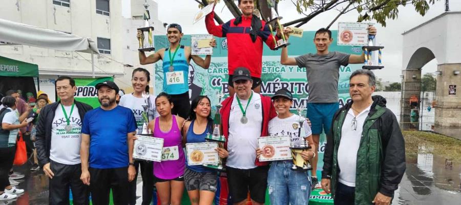 Luis Fernando Herrera y Belém Valdéz, los ganadores de la carrera UJAT