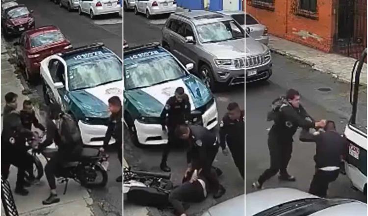 Captan presunta agresión de policías de CDMX a motociclista