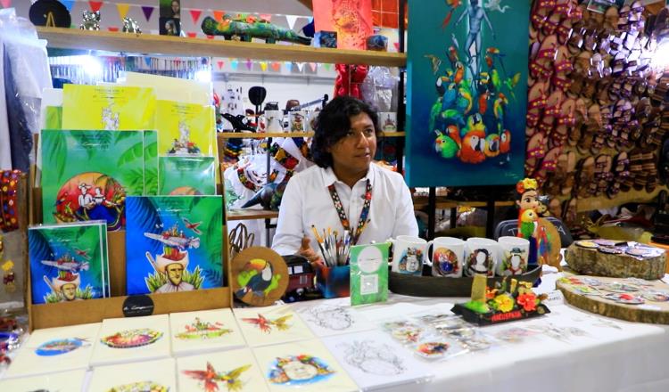 Pintura popular en la Feria Tabasco con artista macuspanense